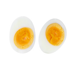 Sliced hard boiled egg on white background