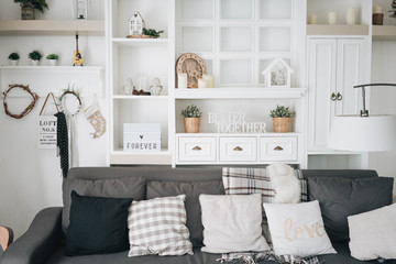 Home decor - Bright cosy comfy white living room with winter decorations for family or couple.