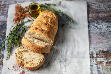 Homemade Italian bread with herbs and spices. Selective focus. Macro.
