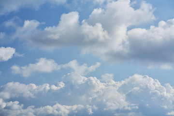Clouds in the blue sky. Blue sky and volumetric white clouds.