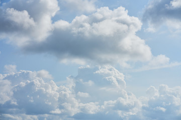 Blue sky and fluffy white clouds. Clouds in the blue sky