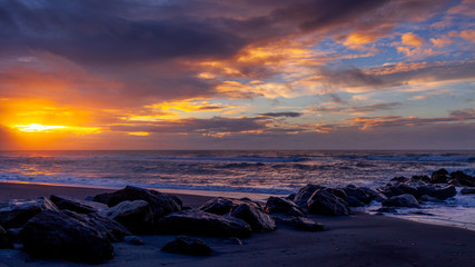 Obraz premium Sunset at Hokitika beach in New Zealand