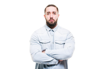 Closeup full face portrait of strong bearded caucasian man with crossed hands isolated at white background.