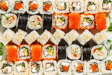 tasty sushi on the white background