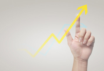 Hand touching a graphs of financial indicator and accounting market economy analysis chart
