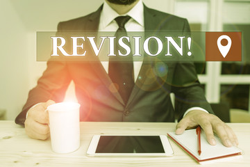 Writing note showing Revision. Business concept for action of revising over someone like auditing...