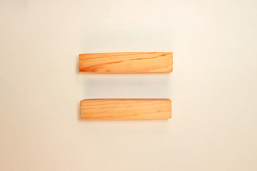 Wood bar pieces with shadows on white background. Horizontal wooden bars as concept of kids development toy, construction or decoration. Mockup shelves section