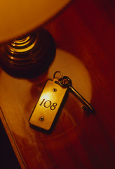 Room 108 key illuminated by room lamp.