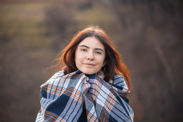 Fototapeta premium Portrait of beautiful young woman outdoors