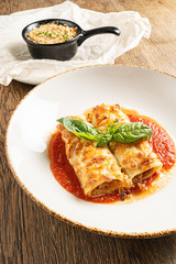 tasty lasagna with tomato sauce