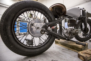 Fototapeta premium Garage for the assembly of retro old-school bikes.