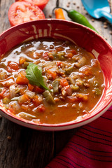Mexican style lentil soup with tomato and nopal cactus