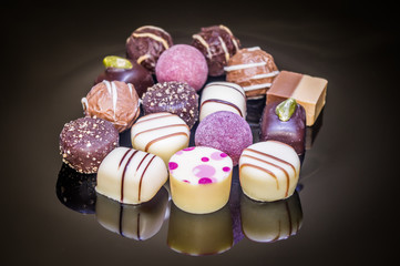 Assortment Sweet Decorated Chocolate Candies and Pralines
