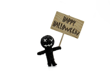 Happy Halloween message on wooden sign with black voodoo doll isolated on white background