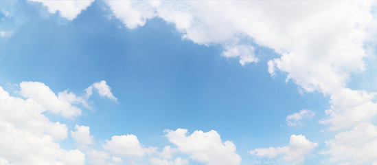 Blue sky with white fluffy clouds for background, panorama view