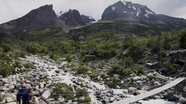 Backpacking Across Bridge in Torres del Paine National Park in Chilean Patagonia 