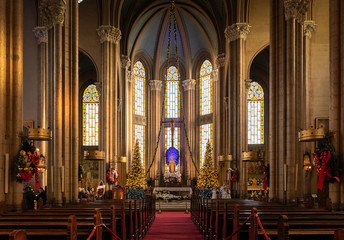 Fototapeta na wymiar Golden interior of catholic church on Istanbul during the Christmas