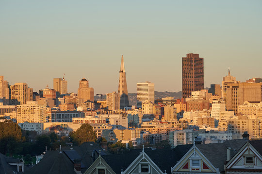 San Francisco downtown skyline during sunset with the Transamerica Pyramid in the center.