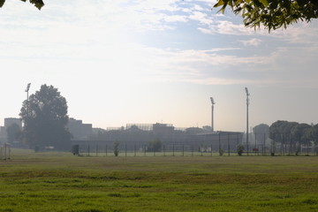Summer, in the distance - football field, general plan, morning, Europe