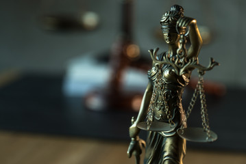 Fototapeta na wymiar Law and Justice, judge gavel with scales on wooden table with blurred background.