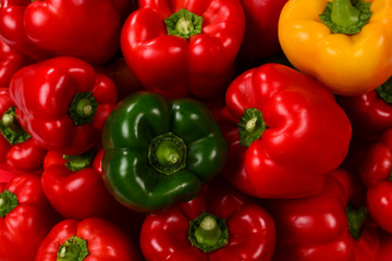 Fresh red, green, yellow bell pepper background.