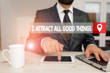 Writing note showing I Attract All Good Things. Business concept for Positive attraction law...
