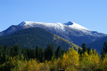 snow mountain in autumn colors