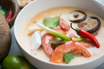 Close-up of thai traditional Tom Yum soup with shrimps, selective focus, studio shot