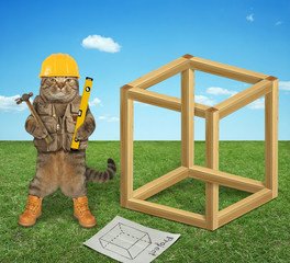 The cat builder in a yellow building helmet, vest and boots is holding a level and a hammer in a...