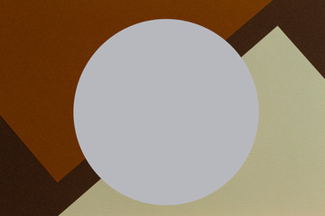 Color papers geometry shape beige and brown color tones composition background with white round template copy space