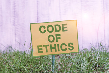 Handwriting text writing Code Of Ethics. Conceptual photo basic guide for professional conduct and...
