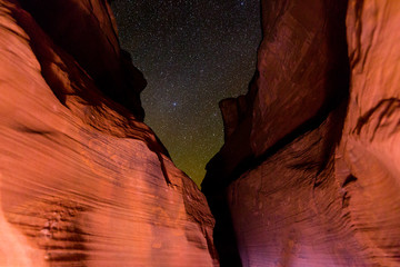 Horseshoe Bend Canyon, aka Secret Canyon, Page, AZ, USA. The clear night skies of northern Arizona viewed from within Secret Canyon.