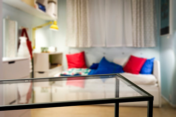 Table background of free space and blurred background of window in home interior 