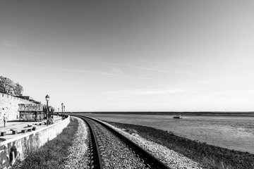 Black and with landscape of the railway along Faro old town, Algarve, Portugal