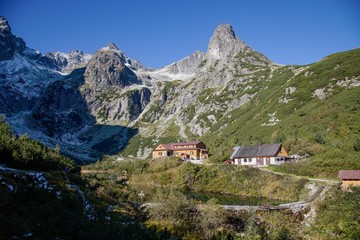 Fototapeta na wymiar Cottage at green lakein High Tatras National park, Slovakia 