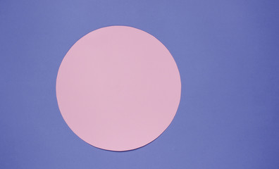 Purple background with pink pastel circle for copy space