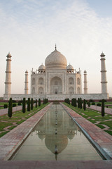 Fototapeta na wymiar Agra, India. Taj Mahal reflected in its reflecting pool.