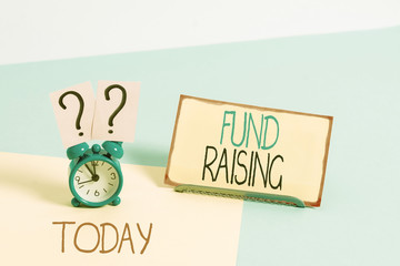 Text sign showing Fund Raising. Business photo showcasing the act of seeking to generate financial support for a charity