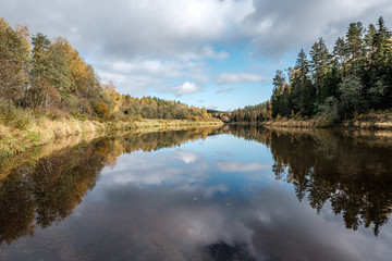 Fototapeta na wymiar beautiful natural lake or river in autumn