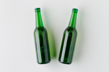 Top view of two beer bottles mockup.