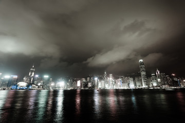 Fototapeta na wymiar Colourful skyline and the famous Victoria Harbour in Hong Kong, SAR of China, seen from Kowloon