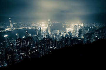 Obraz premium Skyline of Hong Kong and the Victoria Harbour seen from Victoria Peak on Hong Kong Island - SAR of China