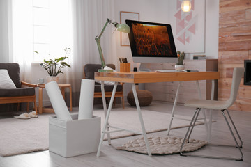 Comfortable workplace with modern computer on desk. Home office
