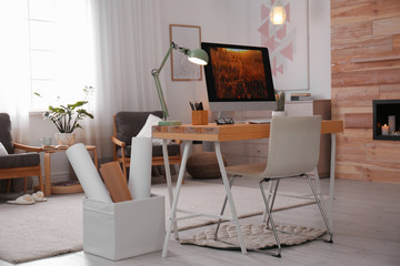 Comfortable workplace with modern computer on desk. Home office
