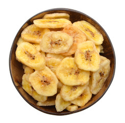 Banana chips in wood bowl on white background