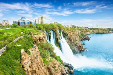 Lower Duden waterfall in Antalya, Turkey. Water falls drop off rocky cliff directly into...