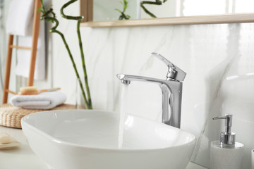 Stylish white sink in modern bathroom interior
