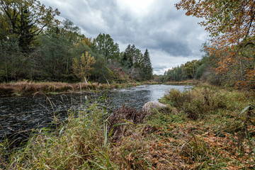 beautiful natural lake or river in autumn