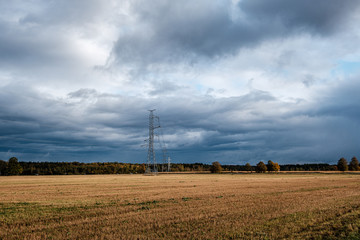 storm clouds over asphalt road in perspective