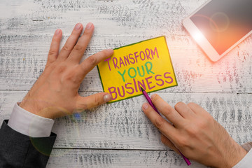 Writing note showing Transform Your Business. Business concept for Modify energy on innovation and...